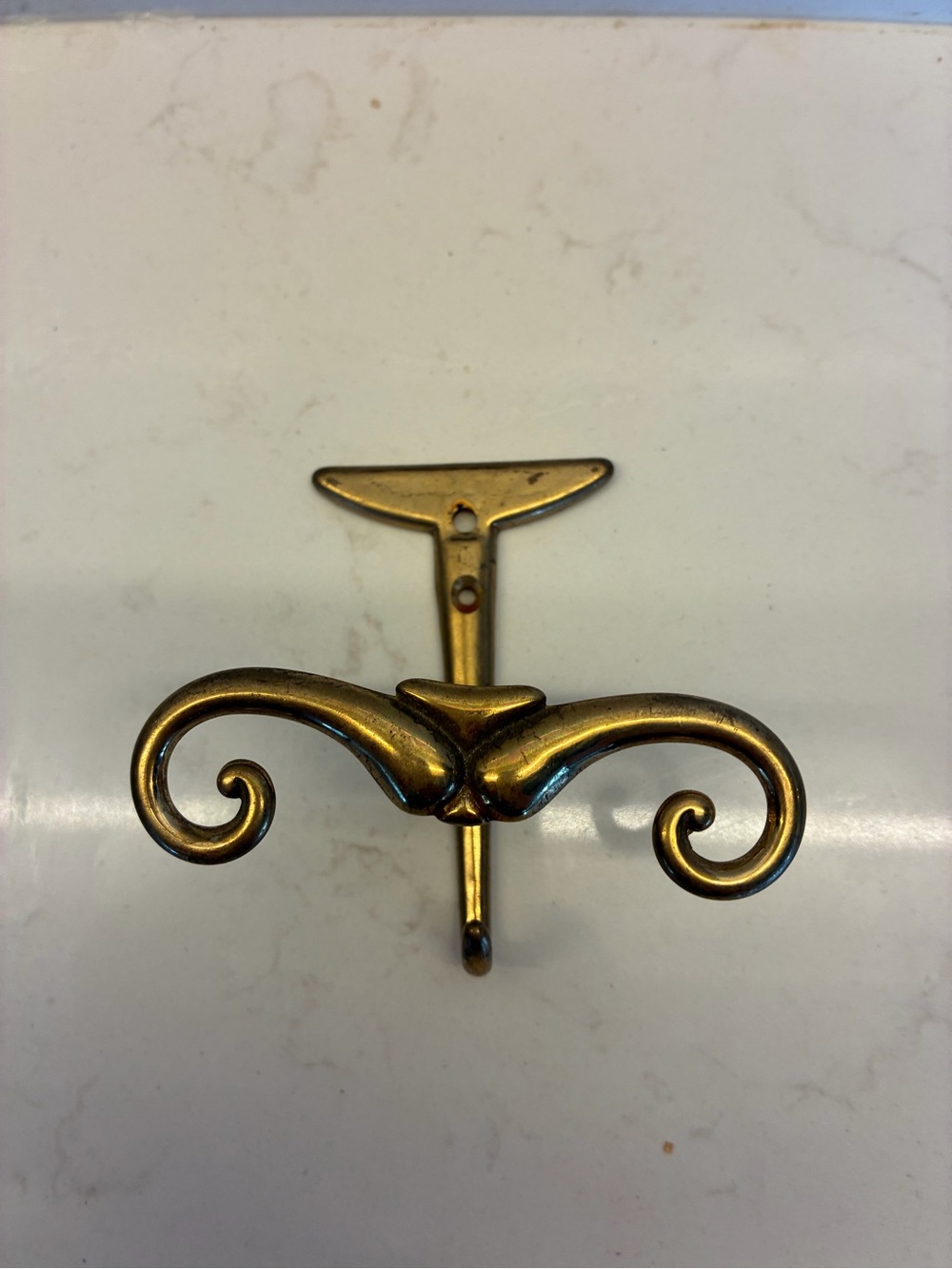 Vintage Victorian-style brass triple coat and hat hook. 4 x 4 in
